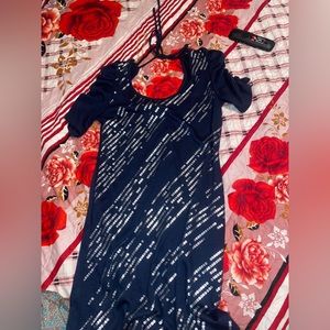 A dark blue sequin dress